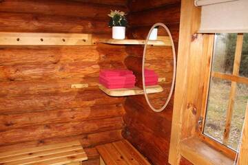Фото номера Дом с 2 спальнями Дома для отпуска Haudamäe Holiday Home г. Meelva 48
